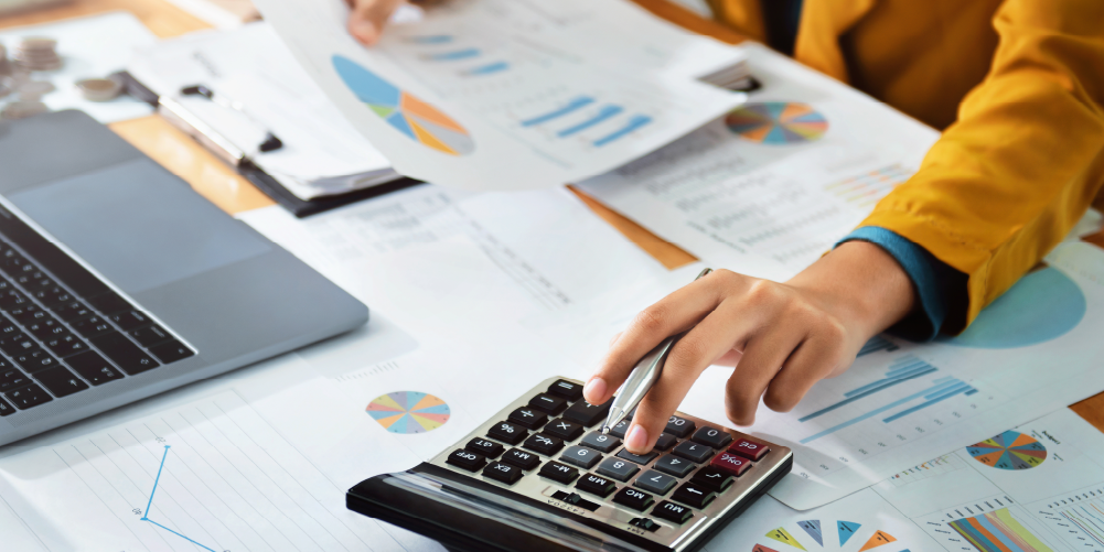 Up close photo of someone reviewing financial documents