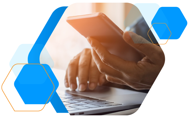 hands typing on laptop